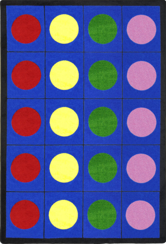 A colorful rug with spaces for each individual child assigned with a colorful dot in each space. 