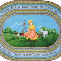 An oval children's rug with Mary and a little lamb in a field. This kids rug also contain the words to the nursery rhyme Mary had a little lamb.
