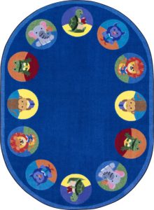 An oval classroom seating rug with animals inside circles around the edge of the rug.