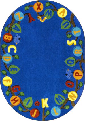 A blue oval educational kids rug with the alphabet in upper case on leaves of a tree.