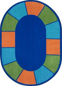 An oval classroom rug with individual blue, green, and orange seating squares around the edge.