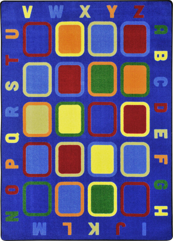 ALPHABET TILES RUG 1 An educational rug with multi-colored squares and alphabet around the edge.